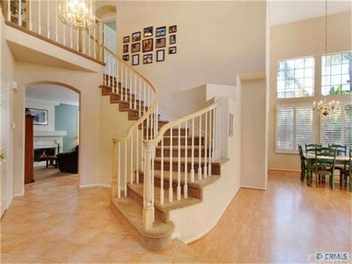 The vaulted ceilings and curved staircase make a g