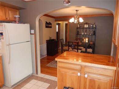 UPDATED KITCHEN LEADS TO DINING ROOM WITH HARDWOOD