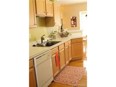 UPDATED KITCHEN WITH GORGEOUS HARDWOOD FLOORS! TON