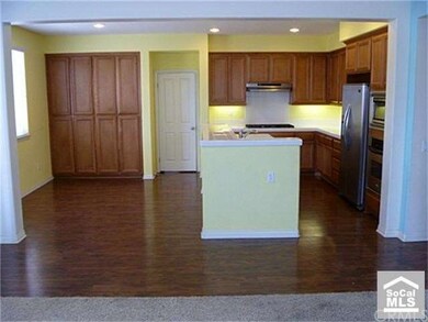 View of kitchen & dining area from family room
