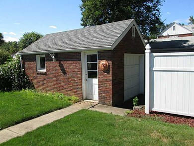 Parking Lot/Garage. detached one car garage to the