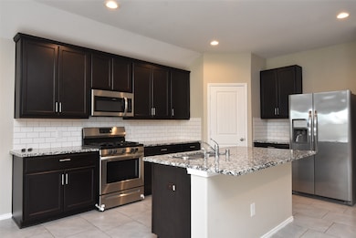 Granite counters and stainless appliances