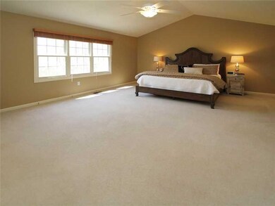 Master Bedroom. Spacious Master bedroom retreat features vaulted ceilings, gorgeous tree-lined views & oversized walk-in closet and plenty of room for extra seating area to relax!