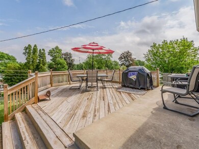 Extra large deck leads to a beautiful yard