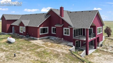 Back of property featuring a patio and cooling uni