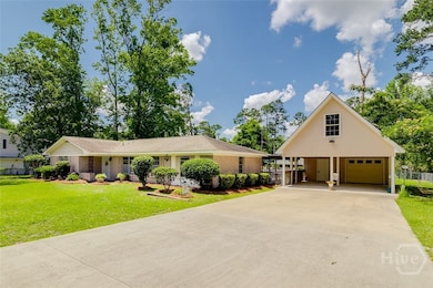 EXTERIOR FRONT GARAGE/CARPORT VIEW