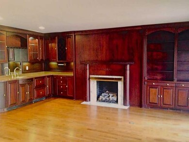 Living Room. Newly finished flooring with banquet 