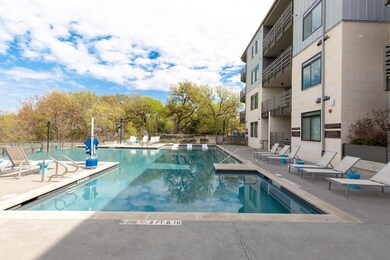 Community pool with a patio area