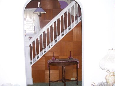 Other front entry and stairway to upstairs