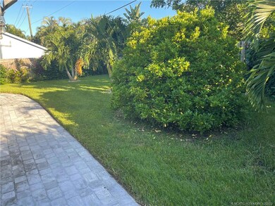 Beautifully landscaped fenced back yard for comple