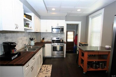 Gleaming modern kitchen!  New appliances, tile bac