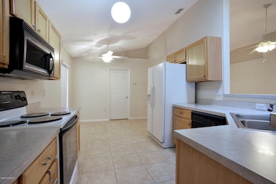 2133 Spring Creek Cir NE, Palm Bay, FL 32905 - photo 4