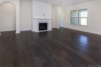Open Family Room with Gas fireplace and cable prew