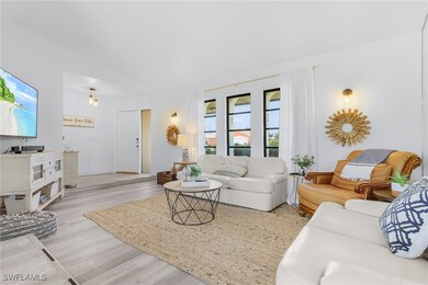 Living room featuring light wood finished floors,