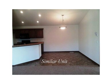 Dining Area. Picture is of Similar Unit.