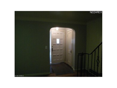Old world charm with cove ceilings, arched doorway