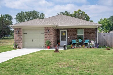 Charming 2021 brick home nestled toward the end of a friendly cul-de-sac.