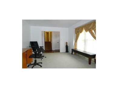 Living Room opens to front foyer area.