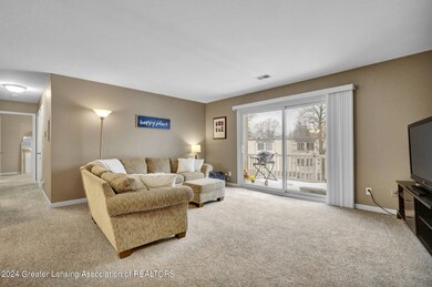 2. Living Room with Balcony access