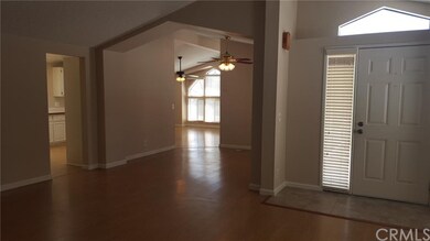View of Entry, Dining and Family Room from Living 