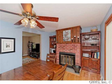 Dining Room Wood-burning fireplace and bookcases o