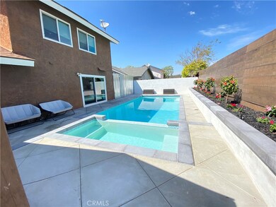 Heated pool and jacuzzi, with clean, modern lines and new tile