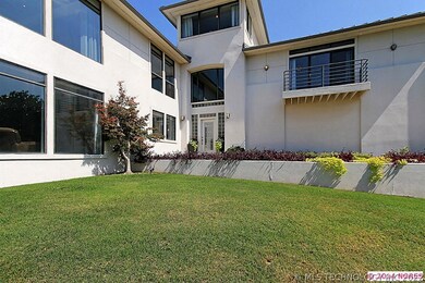 DRAMATIC FRONT ELEVATION BOASTS BOLD PICTURE WINDO