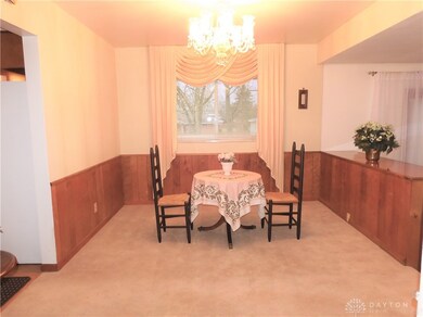 Dining Room opens to the kitchen on the left and to the 