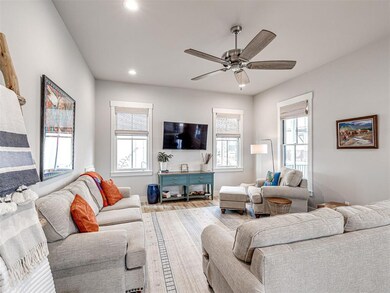Living room with recessed lighting, wood finished 