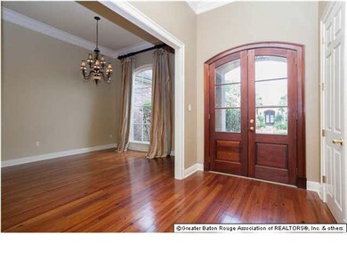 Foyer has heart of pine flooring