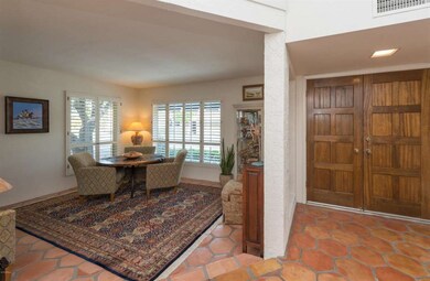 Foyer with Carved Solid Core Door