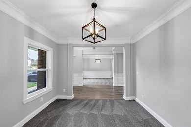 Unfurnished dining area featuring visible vents, a
