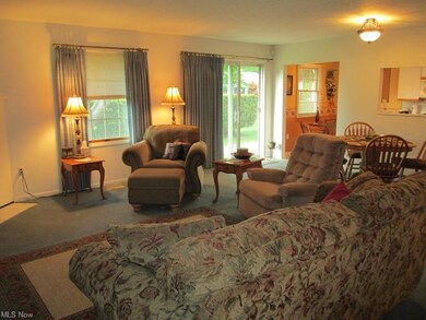 Living Room with dining area and sliders to the ba