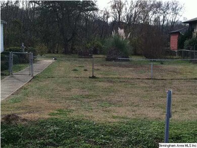 Vacant lot next door is included.