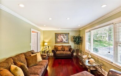 Sun-drenched and open to the foyer Living Area