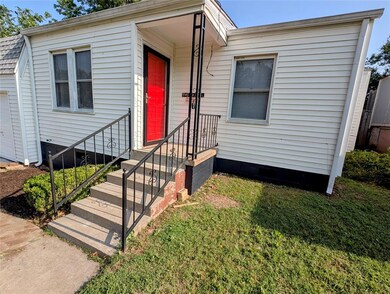 View of front facade featuring crawl space and a front yard