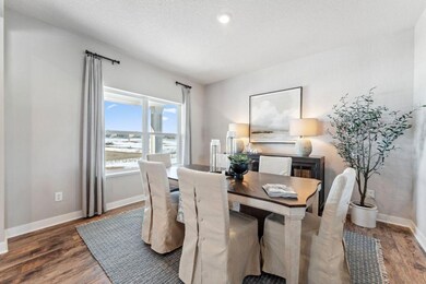 The front flex room is suited for formal dining, a second gathering area, or playroom. You decide! Photo of model home, colors and finishes are similar.