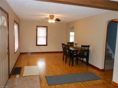 Lovely wood floors in living room and dining room.
