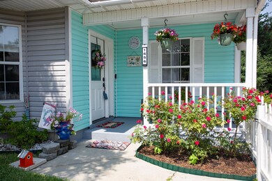 Property entrance featuring a porch