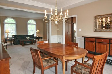 The dining room is open to the living room for a n