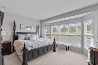 Large master bedroom with bay window, walk in clos