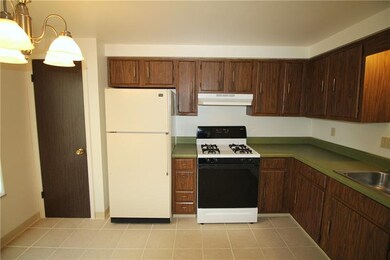 Ceramic tile eat in kitchen.