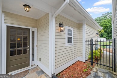 Side entry door is in the courtyard area.