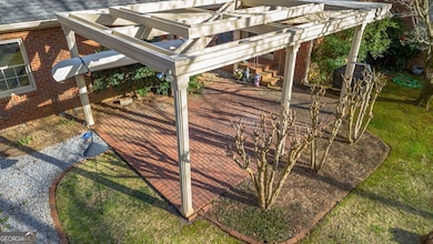 Close up of Pergola and Brick Patio.