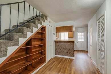 Dining area offer wall of built-in shelving