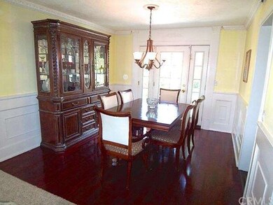 Elegant formal dining room with engineered hardwoo