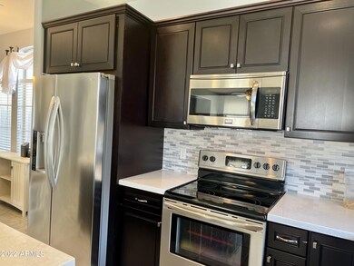 Espresso Cabinets with Quartz counters