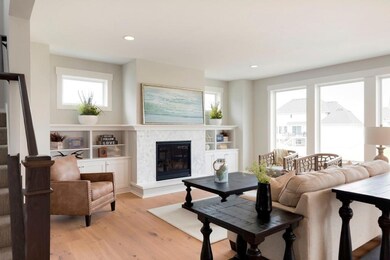 Great room with large windows features tons of nat