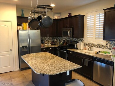 KITCHEN VIEW WITH ALL STAINLESS APPLIANCES AND FOO