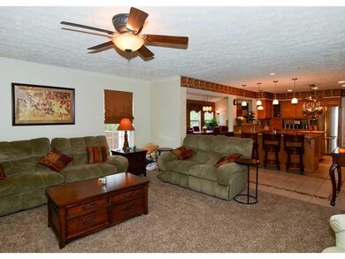 Family Room. Other View from Family room into Kitc
